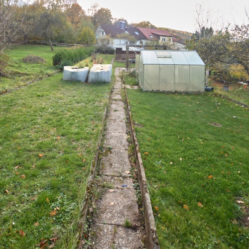 Ruhiges Wohnen in idyllischer Lage – großer Garten & Ausbaupotenzial optimhome Immobilien Deutschland • Kaufen & Verkaufen