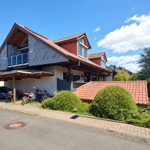 Wohnen mit Charme! Großzügige Dachgeschosswohnung mit Wintergarten und Balkon optimhome Immobilien Deutschland • Kaufen & Verkaufen