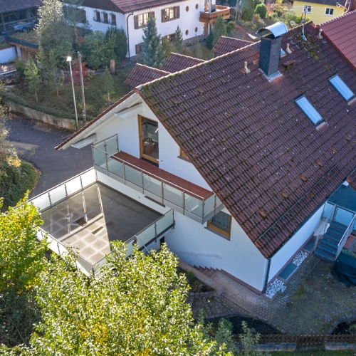 Ruhiges Wohnen in idyllischer Lage – großer Garten & Ausbaupotenzial optimhome Immobilien Deutschland • Kaufen & Verkaufen